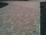 Block Paved Driveway with Concrete Edging and Planting Areas