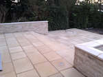 Ely, Cambridgeshire: Patio, steps and inset lighting with co-ordinating retaining wall